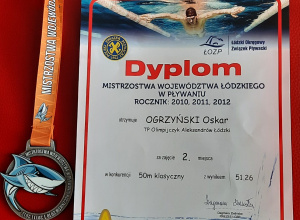 Dyplom uznania i medal za zajęcie drugiego miejsca w mistrzostwach